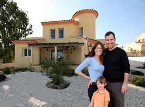 Family with newly purchased spanish house
